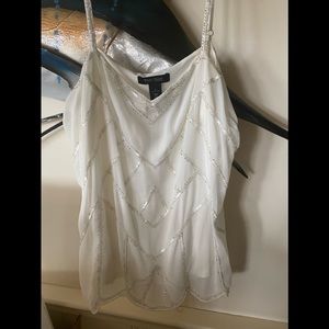 Ivory with silver sequence sleeveless top, flows so pretty! Size large